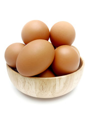 Raw fresh brown chicken eggs isolated on white background.