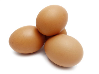 Raw fresh brown chicken eggs isolated on white background.