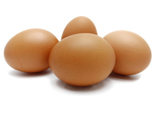 Raw fresh brown chicken eggs isolated on white background.