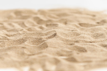 Fototapeta na wymiar Pile dry sand isolated on white background