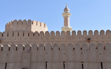 Nizwa Castle Outer Walls with Nearby Minaret, Oman