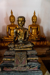 Old Buddhia at Big Golden Reclining Buddha of Wat Pamok Worawihan