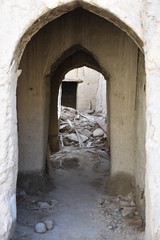 Fototapeta na wymiar Series of Rough Arabesque Arches and Rubble, Nizwa, Oman