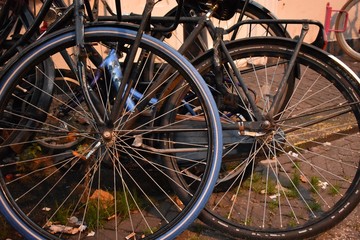 Fototapeta na wymiar Old bicycles leaned against a wall