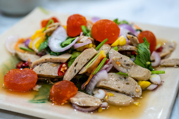 Vietnamese Sausage Spicy Salad in Square dish Closeup shot