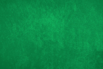 Fondo de pared con manchas de color verde.