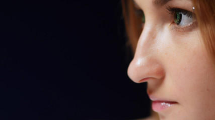 Fototapeta premium close-up. girl face in profile with lenses eyes. copy space