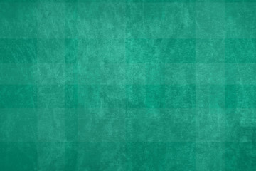 Fondo de pared con manchas de color verde.