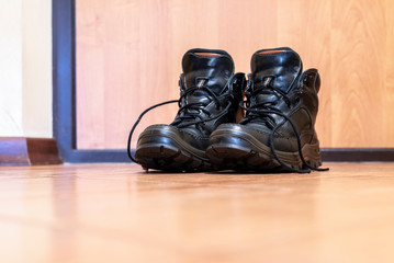 Old hiking boots at the front door