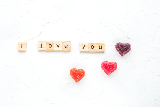 inscription i love you on white wooden background.concept. Vertical photo