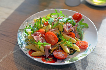 fresh salad with cherry tomatoes and black olives
