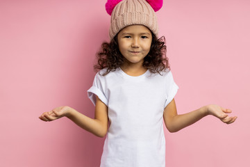 Portrait of a pretty curly little girl