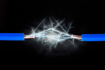 Electrical spark between two insulated copper wires