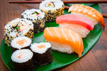 assorted japanese sushi food. All you can eat menu. Maki and rolls with salmon, tuna and shrimp