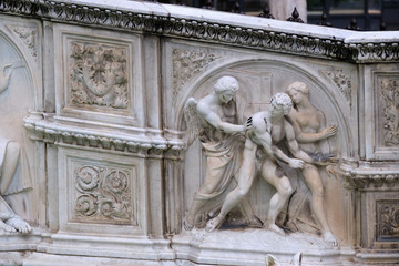 Obraz premium Basso rilievi dalla fontana di Piazza del Campo, Siena Italia