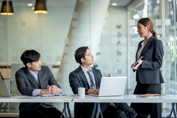 Young asian business group with the creative work, talk and exchange ideas shared at the meeting.