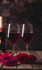 Glasses of Wine With Roses and Gift Box