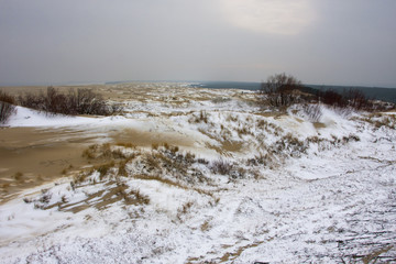 snow-covered desert by the sea