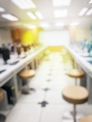 Education concept, Blurred image of the student learning technology and workshop using computer together in computer room in secondary, university for study, Network communication and training