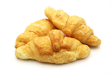 Fresh bread croissant isolated on white background.