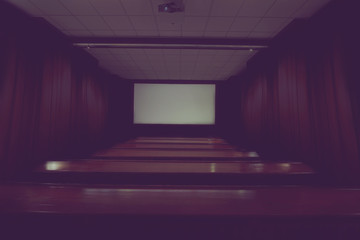small empty lecture hall in dark background