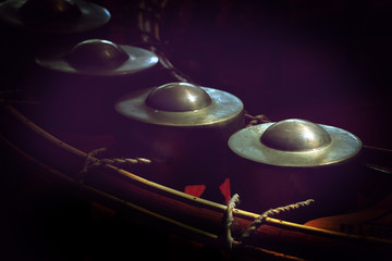 small gongs or gongs wong in dark background, asia tradition percussion instrument, original Thai music instrument.