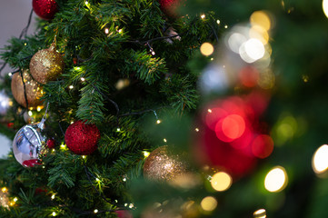 Close up of christmas tree with bokeh of light