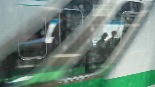 A subway train passing. Fast moving train in Seoul city subway station.