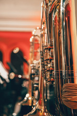 Symphony orchestra on stage, playing the tuba
