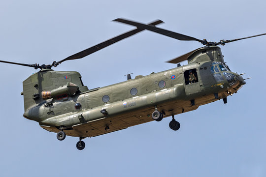 FAIRFORD, UK - JUL 13, 2018: UK Royal Air Force CH-47 Chinook cargo helicopter in flight over RAF Fairford airbase.