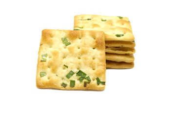 Biscuits cracker square design.Great flavor combination of green onion and wheat. Isolated on white background.