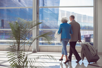 Elderly couple of travelers