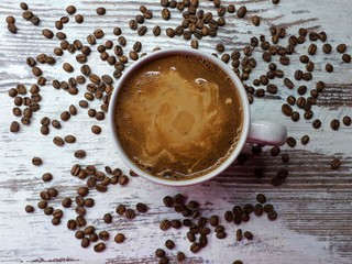  close-up of a hot drink, a large cup of coffee / cocoa on a background of abstract wooden surface