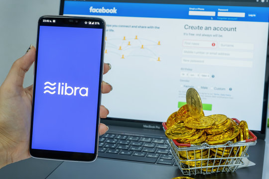 CHIANG MAI,THAILAND - JUNE 20,2019: Libra Facebook cryptocurrency and bitcoin cryptocurrency, Libra coins concept.