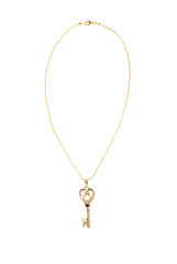 Jewelry pendant in the form of a key on a gold chain on a white isolated background