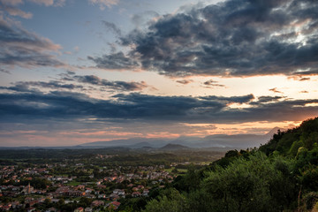 Naklejka na ściany i meble Stormy sunset in the italian countryside
