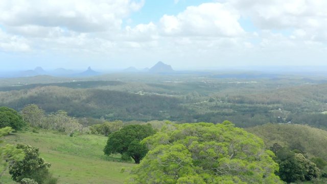 A drone shot of the Glass House Mountains from Maleny.
