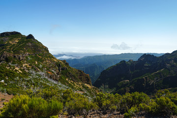 Fototapeta na wymiar Beautiful panorama view of the footpath trail in the mountains of Pico Ruivo, Madeira