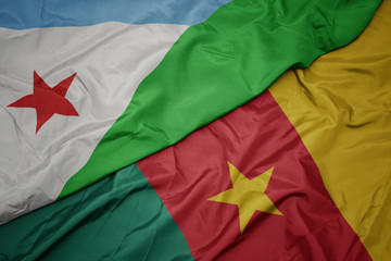 waving colorful flag of cameroon and national flag of djibouti.