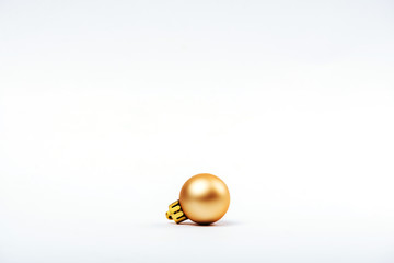 Christmas golden baubles Isolated on white background copy space