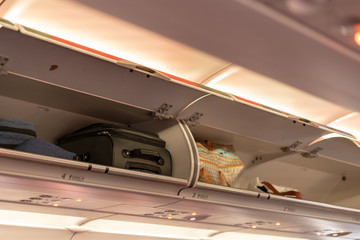 Overhead compartment for put luggage on airplane.