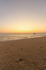 The beautiful light of the sunset at the sea. Mae Ramphueng Beach, Taphong Subdistrict, Mueang Rayong District, Rayong Province, Thailand