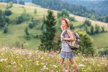 woman hiker enjoy the view at mountain