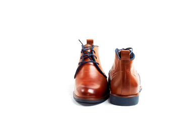 luxurious male brown and blue leather shoes isolated on a white