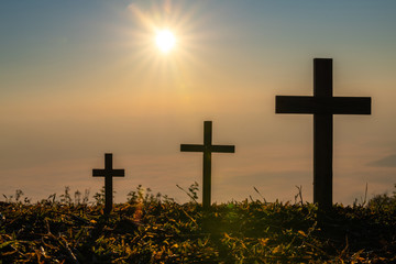 The Crucifixion of Jesus Christ at Sunrise - Three Crosses On Hill. Religious Concepts