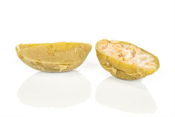 Group of two halves of pickled green caper isolated on white background