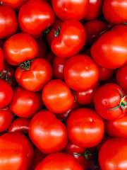 lots of red tomato to eat like a background