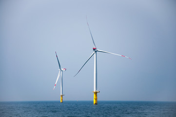 Offshore wind farm with two wind mills in the north sea.