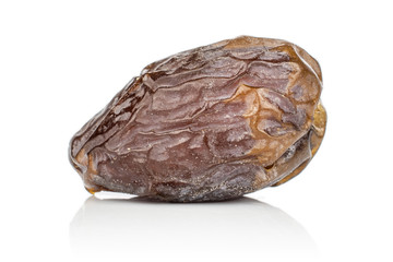 One whole dried brown date fruit isolated on white background