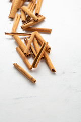Cinnamon sticks on white background
